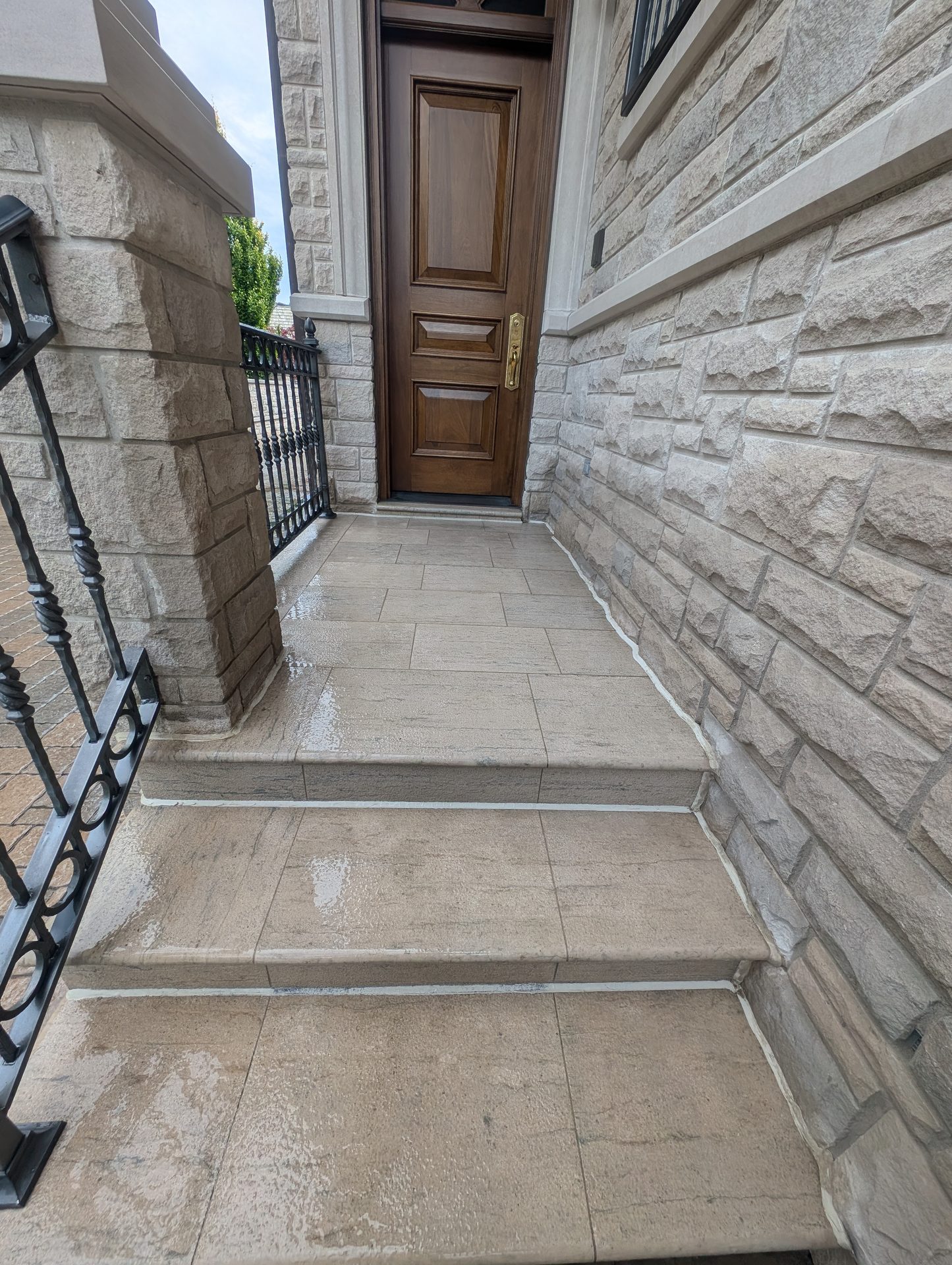 House side entrance chemically cleaned and stripped by Ace Power Washing. Resealed for long lasting effect in Richmond Hill