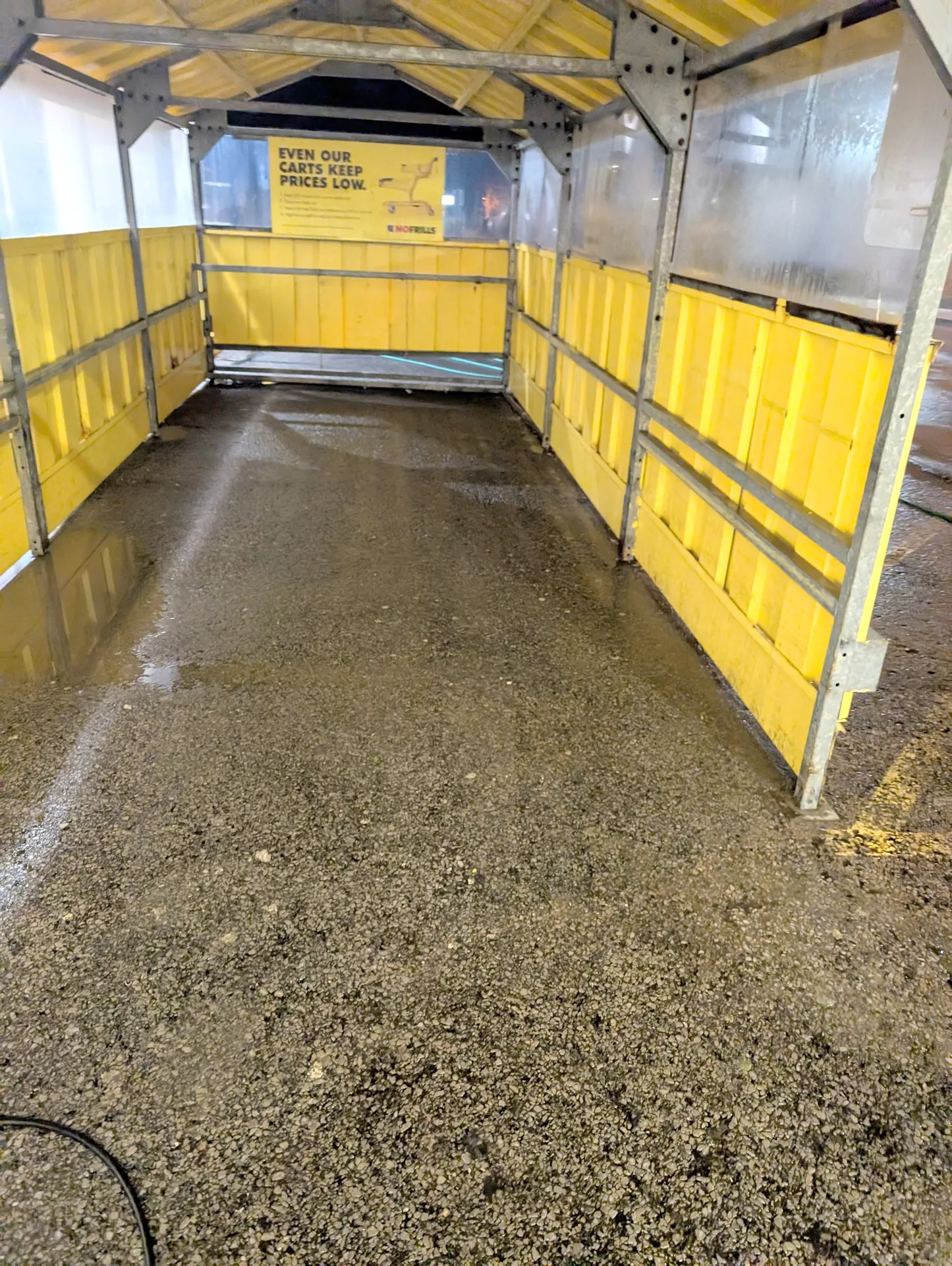 Professionally washed commercial cart enclosure with all litter and surface stains removed