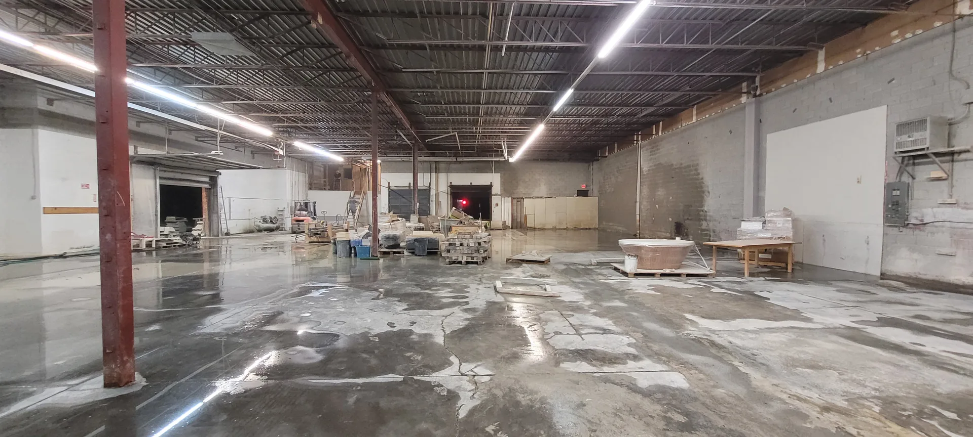 Restored commercial warehouse floor with a clean finish, ready for new industrial tenants