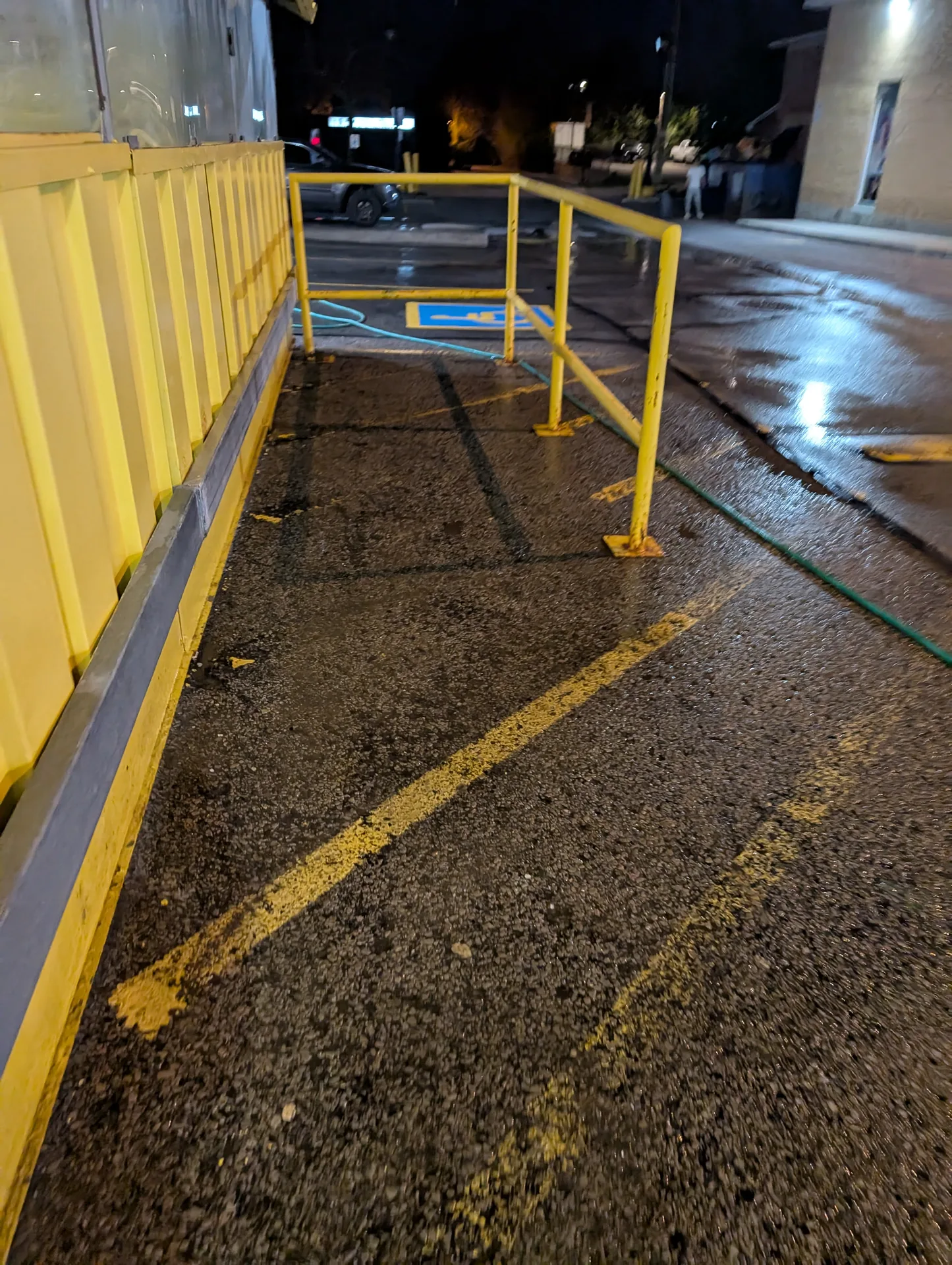 Retail parking lot after professional garbage removal and pressure washing by Ace Power Washing