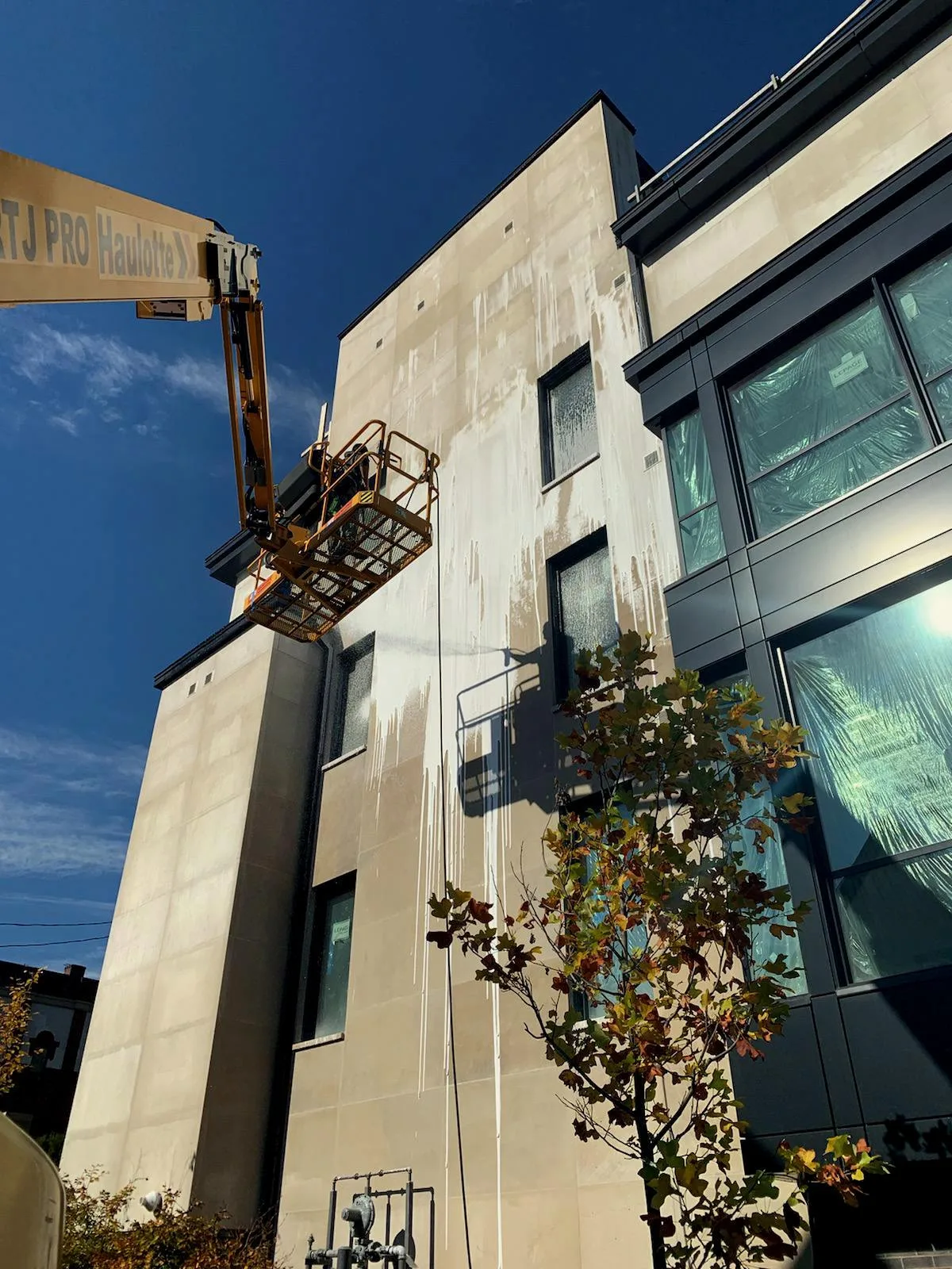 Exterior stone masonry cleaning for a modern townhouse to restore curb appeal and prevent long-term environmental damage