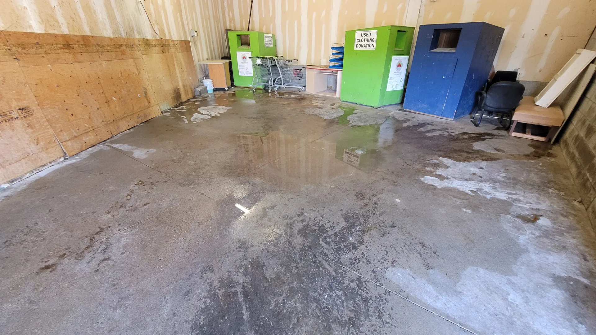 Photo of a clean and sanitized industrial warehouse floor after professional deep hot water cleaning and degreasing services