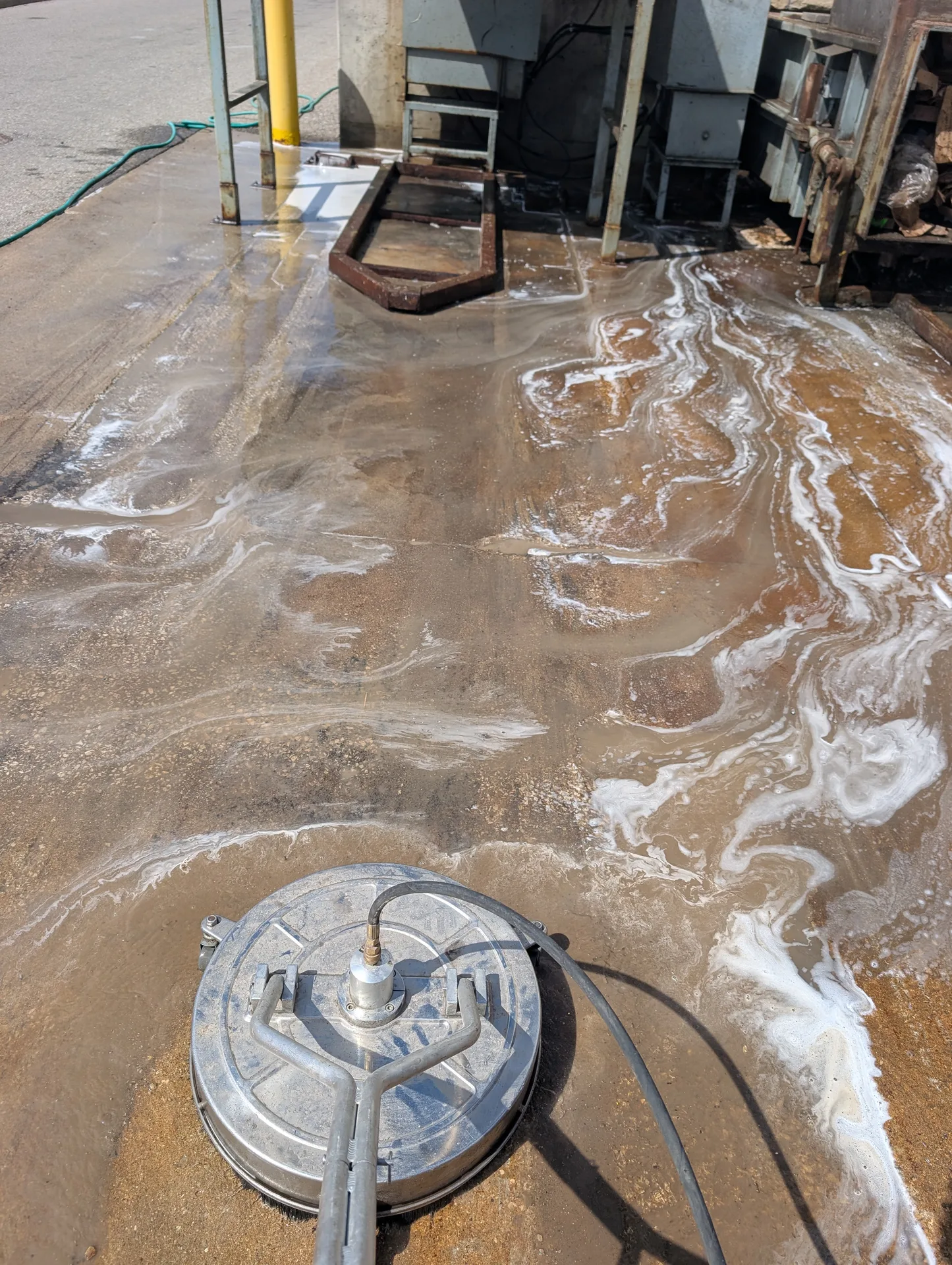 Industrial loading dock concrete degreasing with surface cleaner