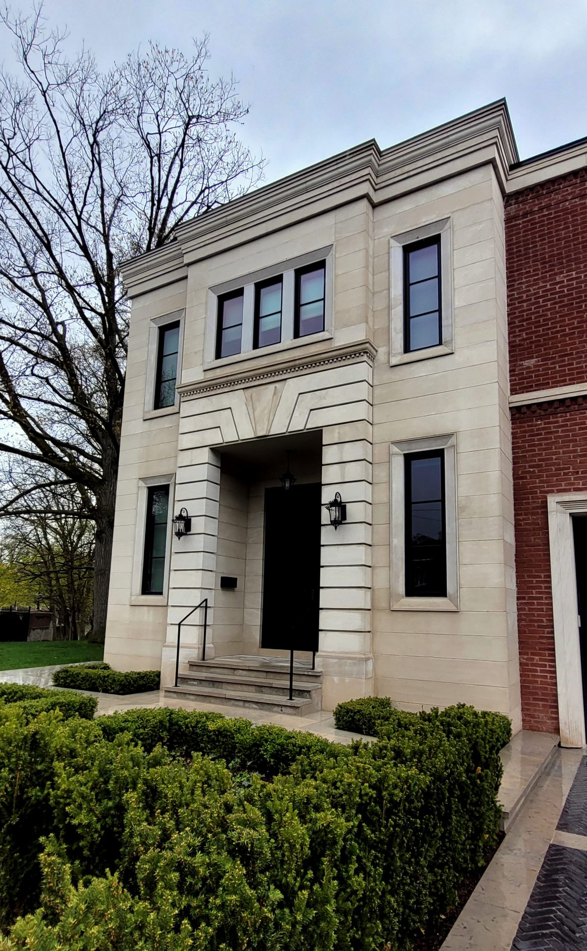 Limestone revitalization in Rosedale by ACE, using specialized professional cleaning technique for luxury residential facades
