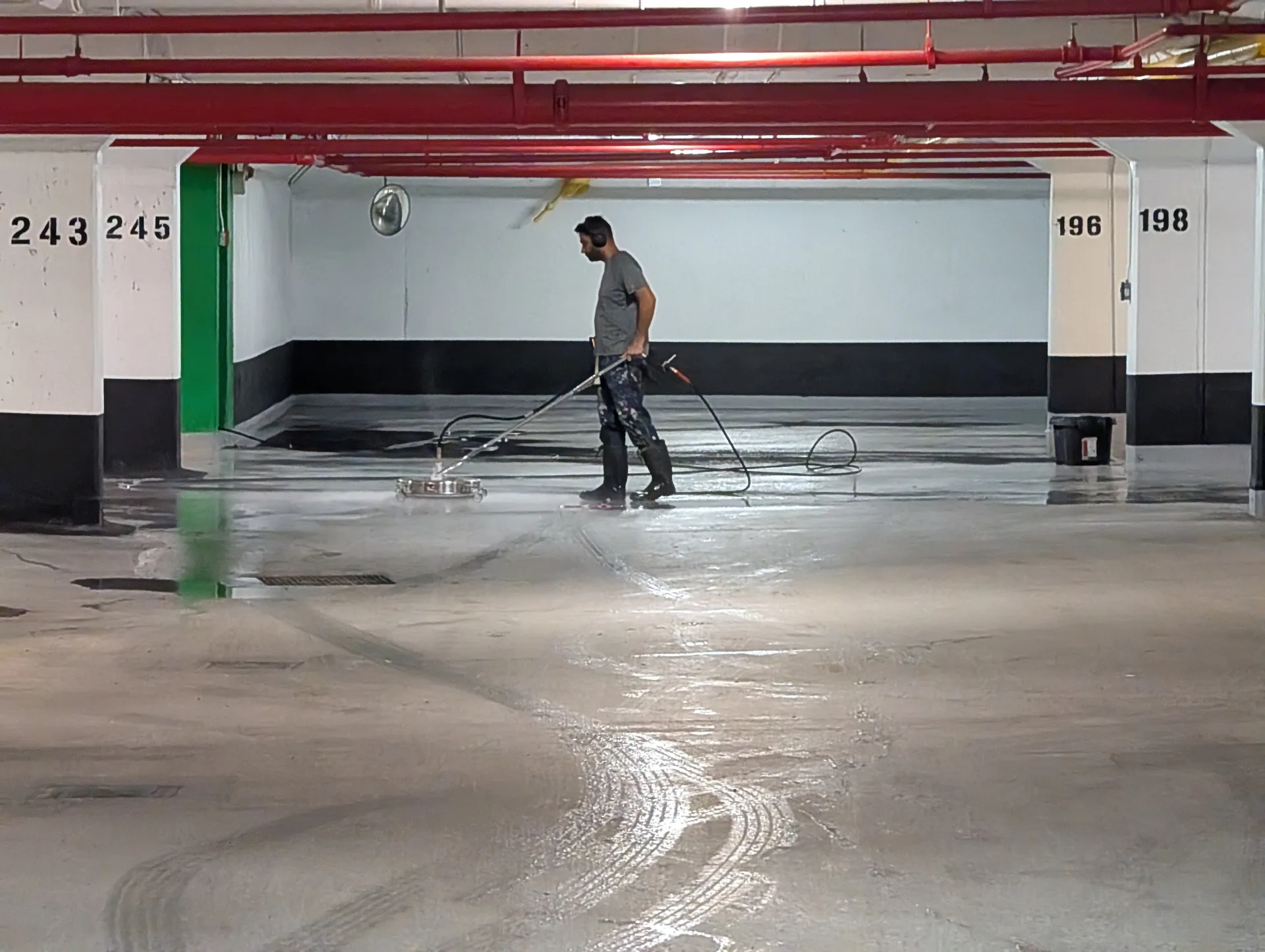 Parking garage tire mark removal and surface cleaning by Ace Power Washing