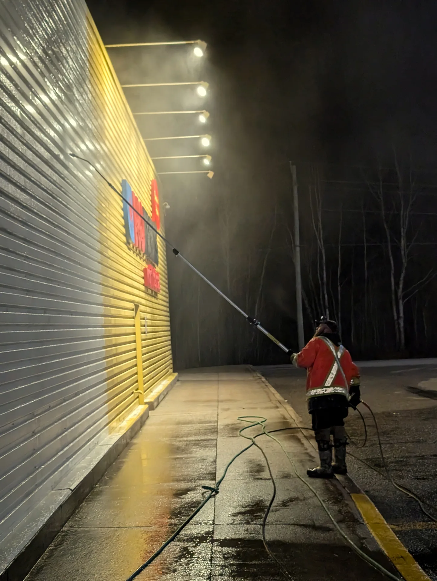 After-hours no business disruption commercial pressure washing for a retail storefront to remove grime and dirt