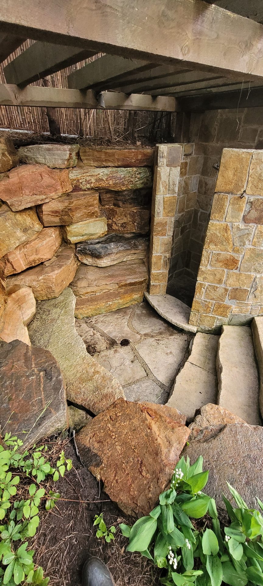 Natural stone outdoor shower in Bridle Path restored to pristine, sanitized condition by ACE professional cleaning